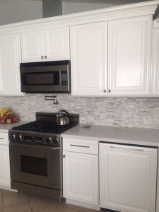 Kitchen Face-lift: Painting the Cabinets, New Countertop and Backsplash