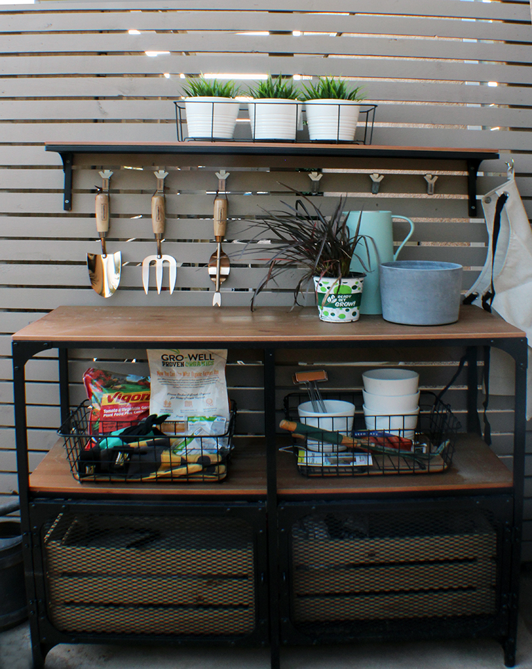 potting bench storage area of inexpensive items from ikea and target for the garden.