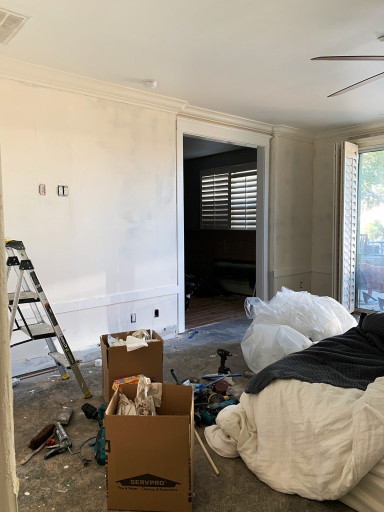 the wainscoting is being applied, the first step is to install the horizontal top board or top rail