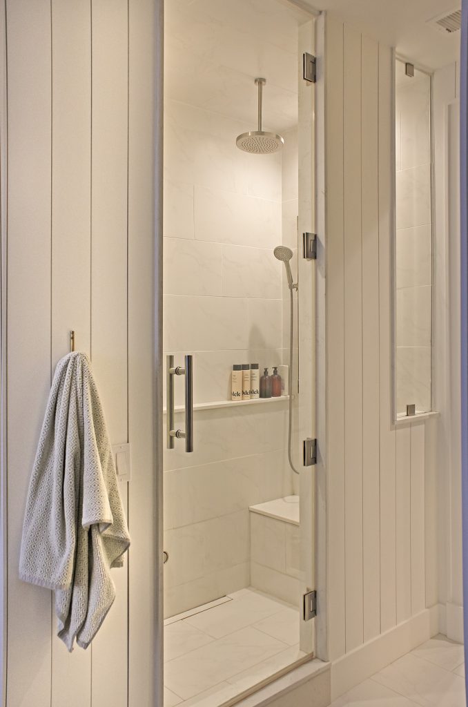 his and hers sides of the showers means no more fighting over the water or water temperature in this remodeled primary bathroom walk in shower.